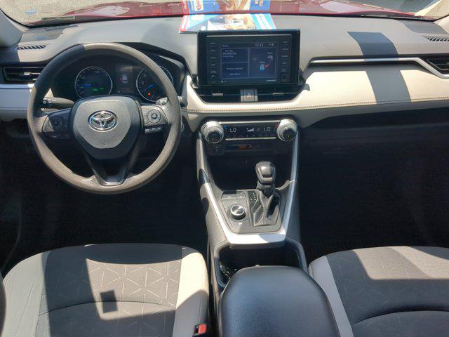 Photo of 2022 Ruby Flare Pearl Toyota RAV4 Hybrid