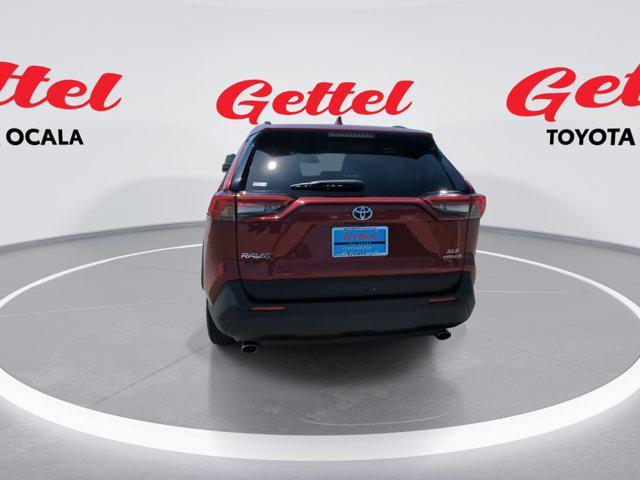 Photo of 2022 Ruby Flare Pearl Toyota RAV4 Hybrid