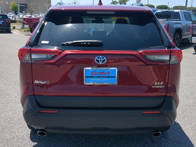 Photo of 2022 Ruby Flare Pearl Toyota RAV4 Hybrid