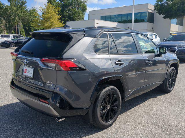 Photo of 2024 Magnetic Gray Metallic/Midnight Black Metallic Toyota RAV4 Hybrid