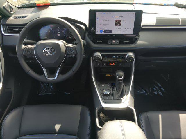Photo of 2024 Magnetic Gray Metallic/Midnight Black Metallic Toyota RAV4 Hybrid