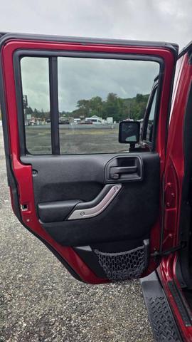 Photo of 2012 Deep Cherry Red Crystal Pearlcoat Jeep Wrangler Unlimited