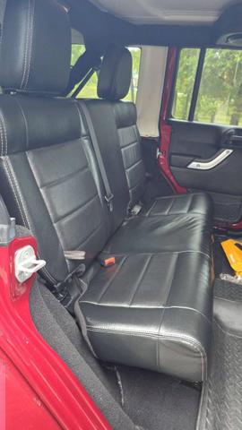 Photo of 2012 Deep Cherry Red Crystal Pearlcoat Jeep Wrangler Unlimited