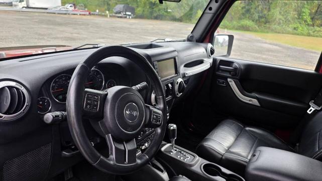 Photo of 2012 Deep Cherry Red Crystal Pearlcoat Jeep Wrangler Unlimited