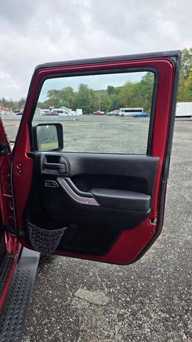 Photo of 2012 Deep Cherry Red Crystal Pearlcoat Jeep Wrangler Unlimited