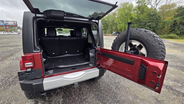 Photo of 2012 Deep Cherry Red Crystal Pearlcoat Jeep Wrangler Unlimited