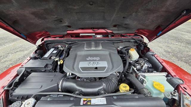Photo of 2012 Deep Cherry Red Crystal Pearlcoat Jeep Wrangler Unlimited