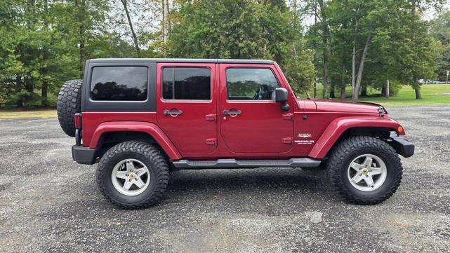 Photo of 2012 Deep Cherry Red Crystal Pearlcoat Jeep Wrangler Unlimited