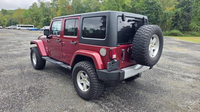 Photo of 2012 Deep Cherry Red Crystal Pearlcoat Jeep Wrangler Unlimited