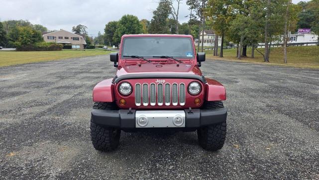 Photo of 2012 Deep Cherry Red Crystal Pearlcoat Jeep Wrangler Unlimited
