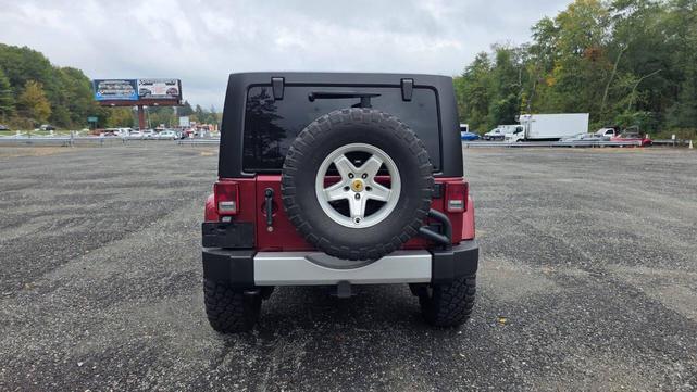 Photo of 2012 Deep Cherry Red Crystal Pearlcoat Jeep Wrangler Unlimited
