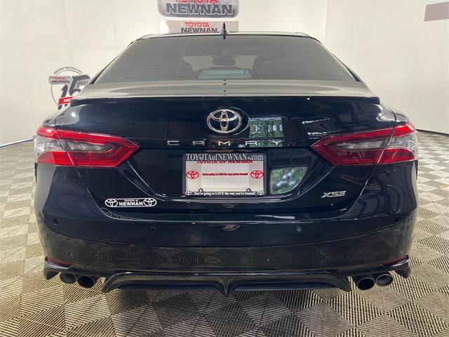 Photo of 2024 Midnight Black Metallic Toyota Camry