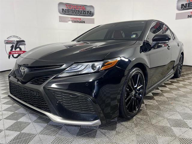 Photo of 2024 Midnight Black Metallic Toyota Camry