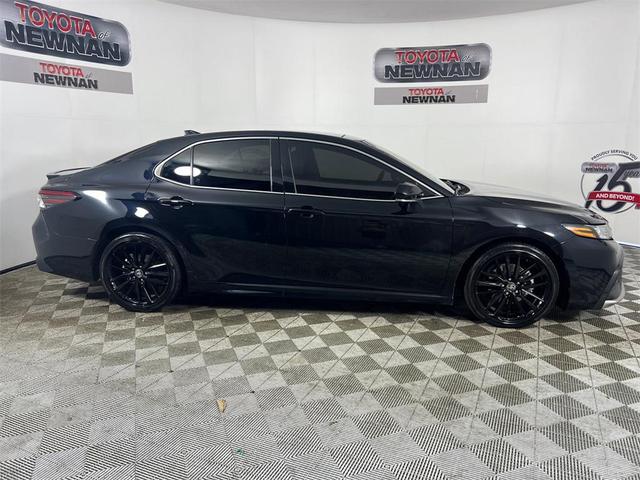 Photo of 2024 Midnight Black Metallic Toyota Camry