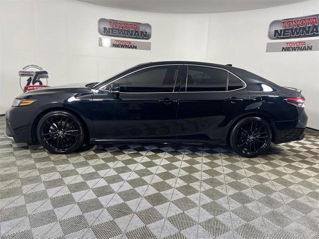 Photo of 2024 Midnight Black Metallic Toyota Camry
