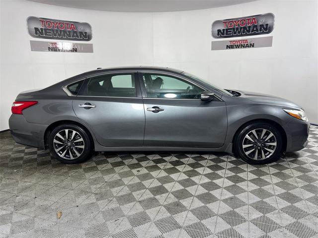 Photo of 2016 Grey Nissan Altima