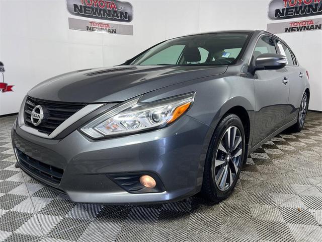 Photo of 2016 Grey Nissan Altima
