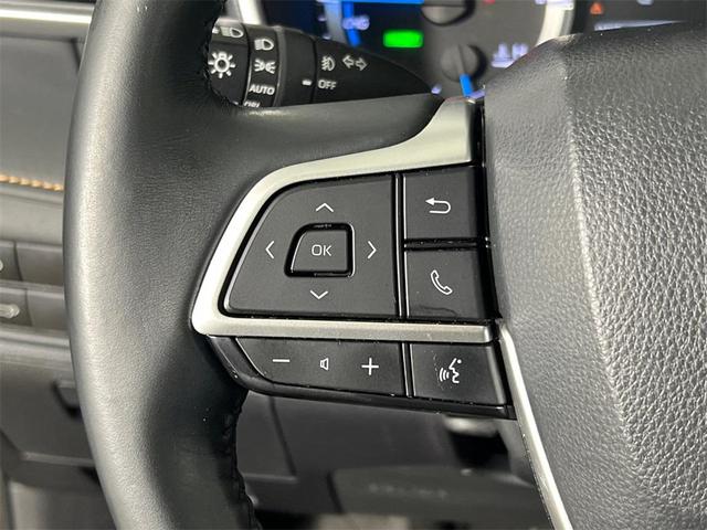 Photo of 2023 Midnight Black Metallic Toyota Highlander Hybrid