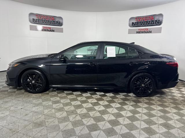 Photo of 2025 Midnight Black Metallic Toyota Camry