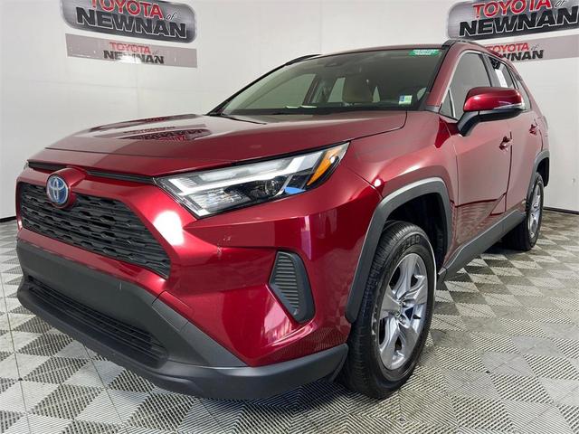 Photo of 2023 Ruby Flare Pearl Toyota RAV4 Hybrid