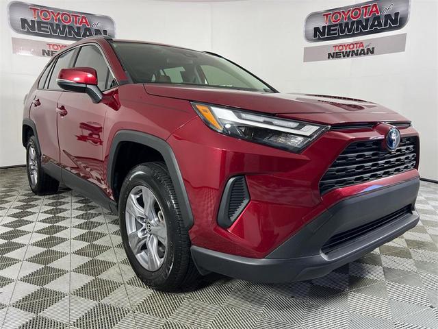 Photo of 2023 Ruby Flare Pearl Toyota RAV4 Hybrid