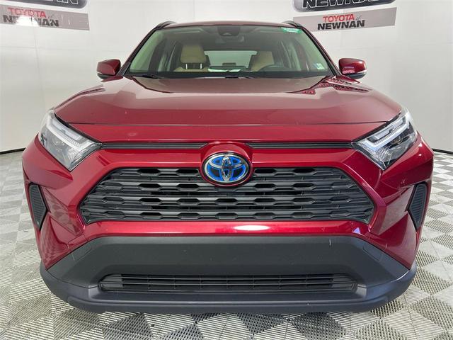 Photo of 2023 Ruby Flare Pearl Toyota RAV4 Hybrid