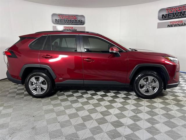 Photo of 2023 Ruby Flare Pearl Toyota RAV4 Hybrid