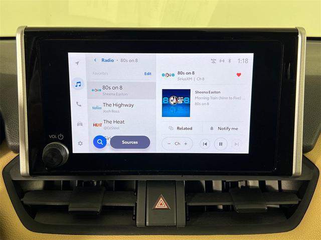 Photo of 2023 Ruby Flare Pearl Toyota RAV4 Hybrid