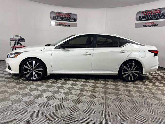 Photo of 2022 Pearl White Tricoat Nissan Altima