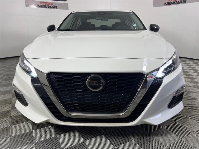 Photo of 2022 Pearl White Tricoat Nissan Altima