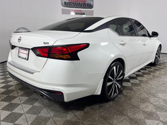 Photo of 2022 Pearl White Tricoat Nissan Altima