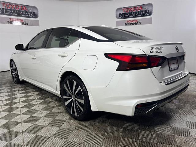 Photo of 2022 Pearl White Tricoat Nissan Altima