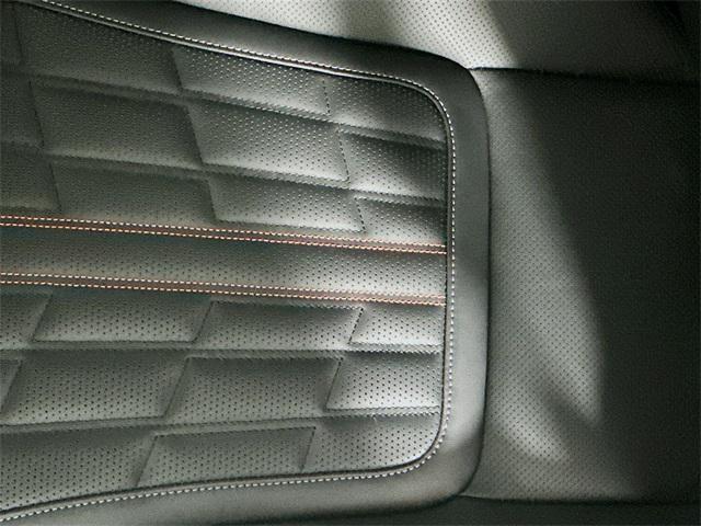 Photo of 2025 Aspen White Tricoat/Super Black Nissan Armada