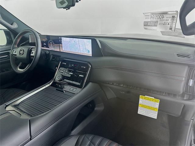 Photo of 2025 Aspen White Tricoat/Super Black Nissan Armada