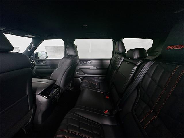 Photo of 2025 Aspen White Tricoat/Super Black Nissan Armada