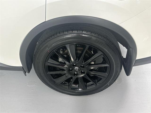 Photo of 2024 Pearl White Tricoat Nissan Murano