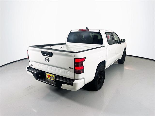Photo of 2024 Glacier White Nissan Frontier