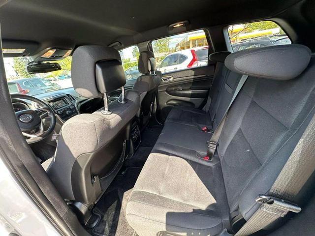 Photo of 2015 Bright White Clearcoat Jeep Grand Cherokee