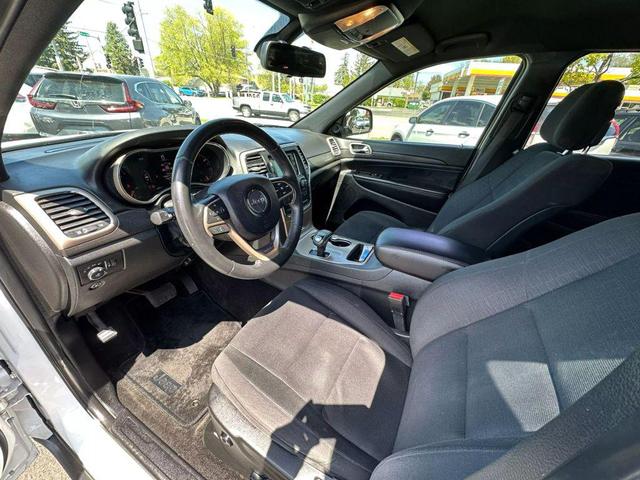 Photo of 2015 Bright White Clearcoat Jeep Grand Cherokee