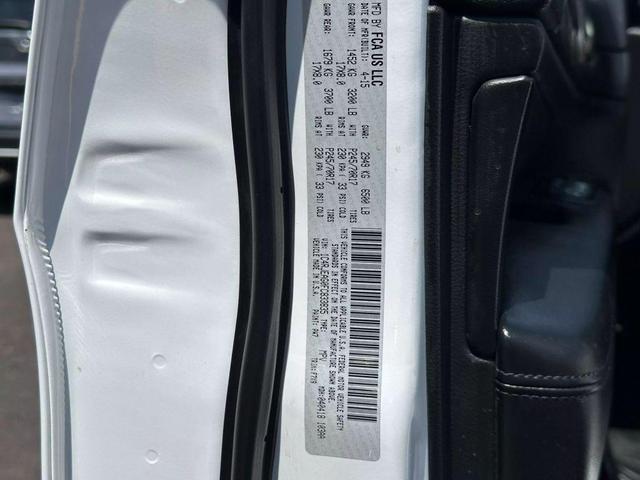 Photo of 2015 Bright White Clearcoat Jeep Grand Cherokee