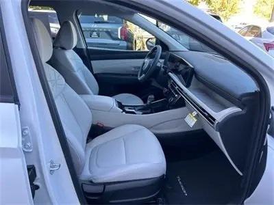 Photo of 2025 Creamy White Pearl Hyundai TUCSON Hybrid