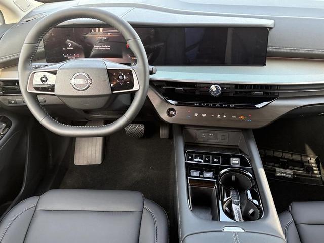 Photo of 2025 XDU 2T Red Black Nissan Murano