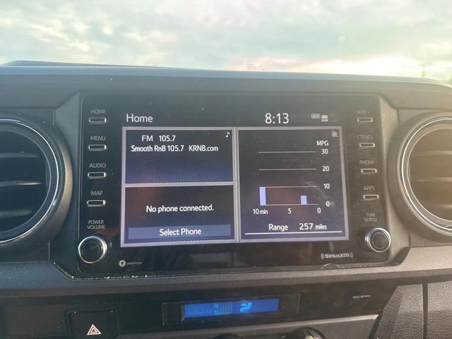 Photo of 2021 Midnight Black Metallic Toyota Tacoma