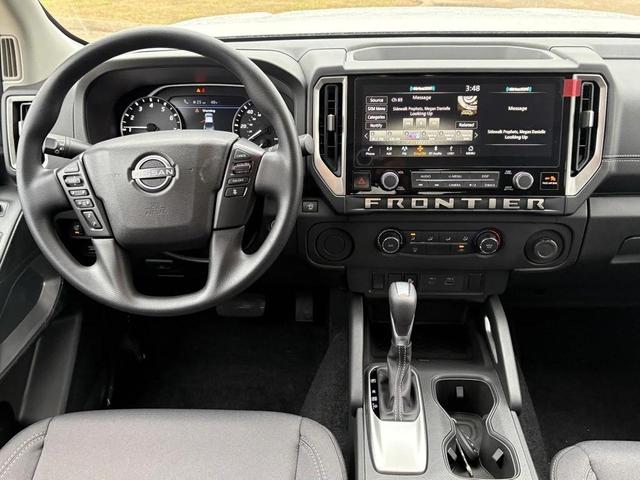 Photo of 2025 Glacier White Nissan Frontier