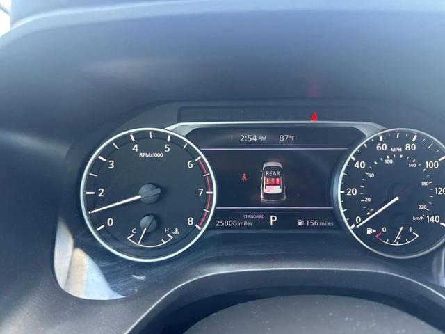Photo of 2023 Pearl White Tricoat Nissan Rogue