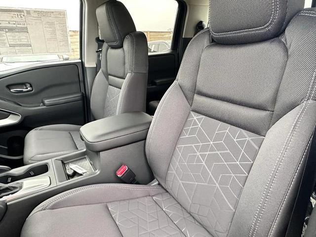 Photo of 2025 Glacier White Nissan Frontier