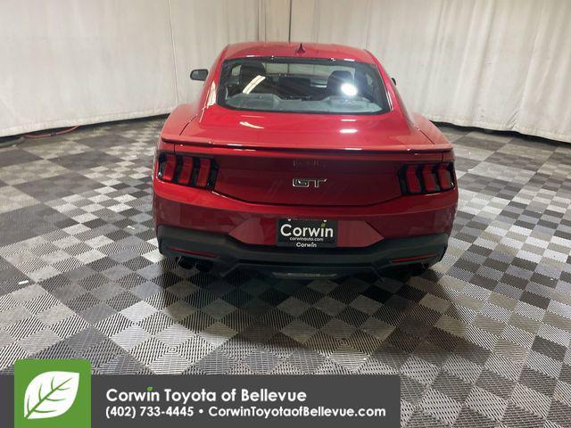 Photo of 2024 Rapid Red Metallic Tinted Clearcoat Ford Mustang