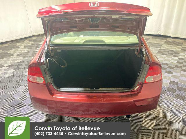 Photo of 2006 Tango Red Pearl Honda Civic