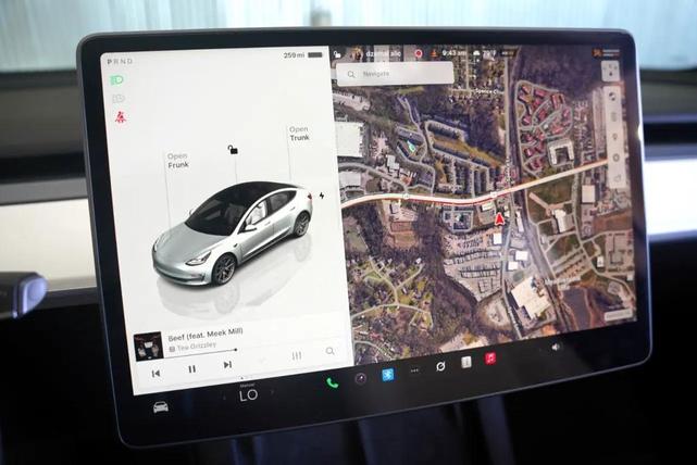 Photo of 2023 Pearl White Multi-Coat Tesla Model 3