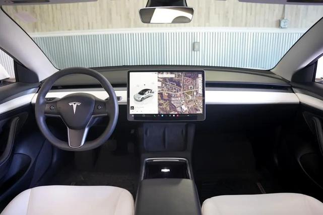 Photo of 2023 Pearl White Multi-Coat Tesla Model 3